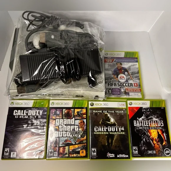 Microsoft Xbox Console with Controller and cords. 60GB. Some staining. Tested